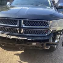 Black Dodge Durango front with the lower bumper cover missing